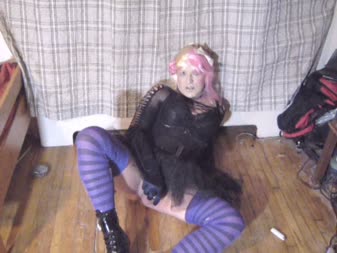 Goth Sissy Tease 2 - Sissy chastity is dressed goth and glam at same time, in chastity, smoking, and teasing. She wants your cock big time, and would suck you dry!